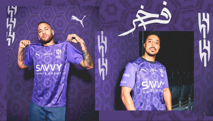 A nova terceira camisa do Al-Hilal, da Puma, em um tom de violeta vibrante, apresenta um design gráfico exclusivo com hexágonos que simbolizam a força da natureza. A gola redonda em preto e os detalhes em branco completam o visual moderno e elegante.